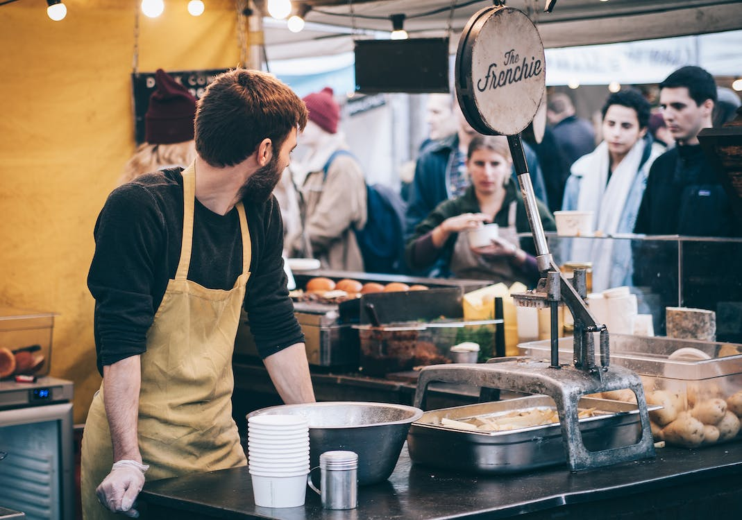 Free Man Standing in Front of Bowl and Looking Towards Left Stock Photo